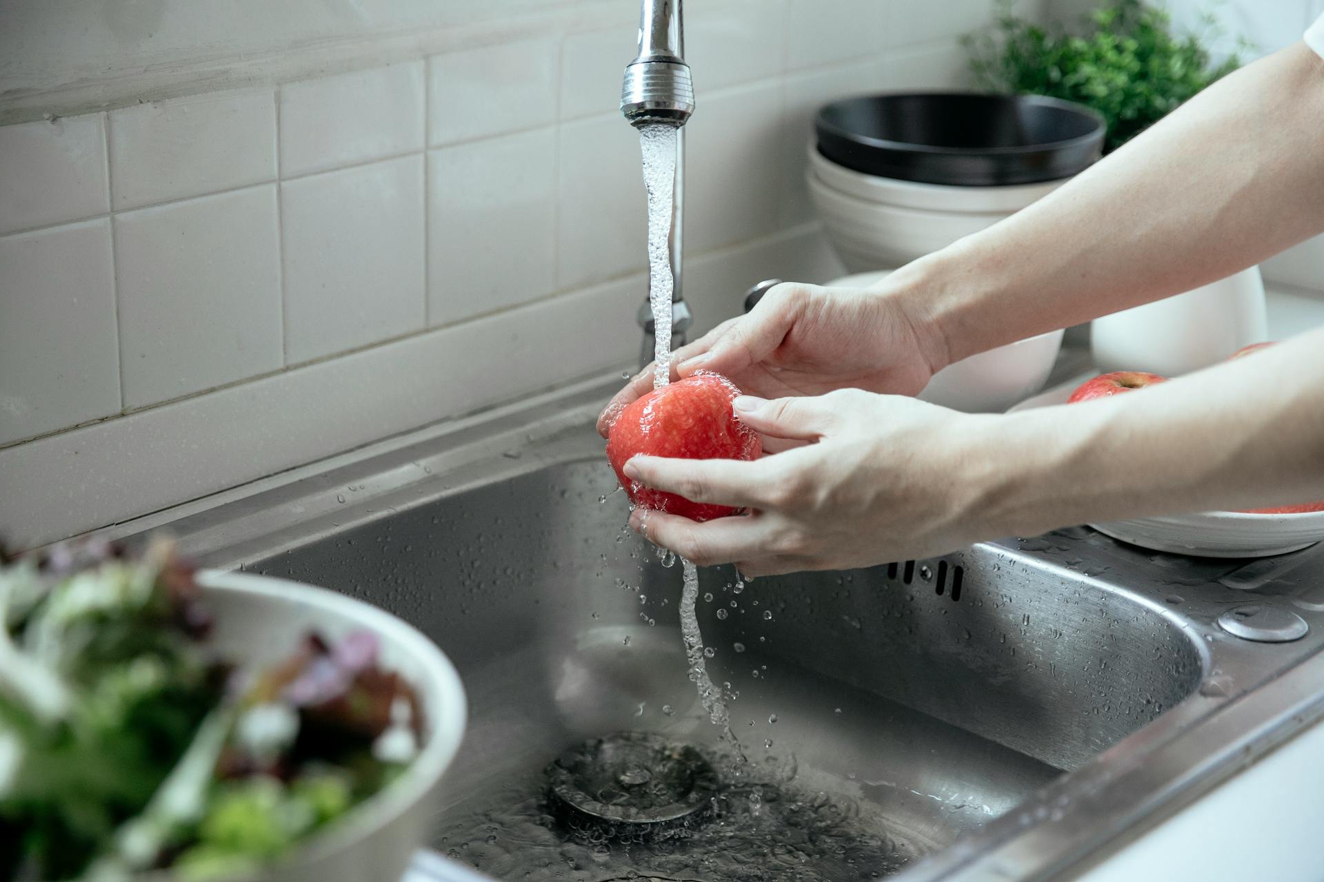 Household tap water being tested for hardness and mineral content — Calgary